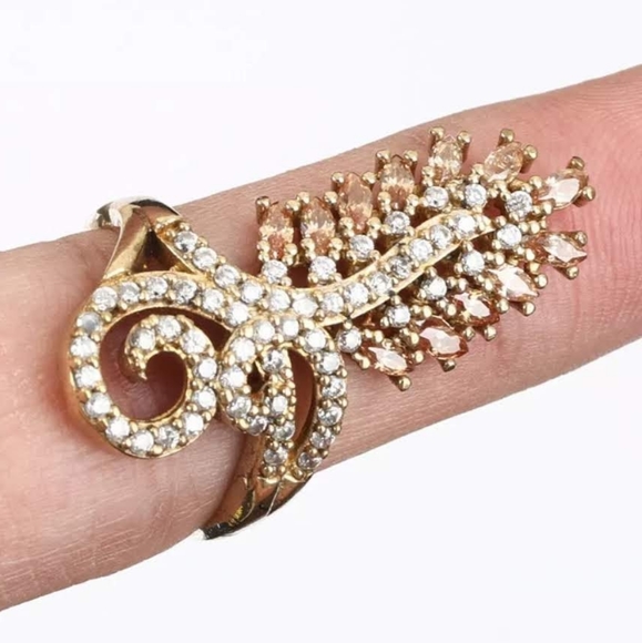 Peach Tanzanite & white topaz feather cocktai ring